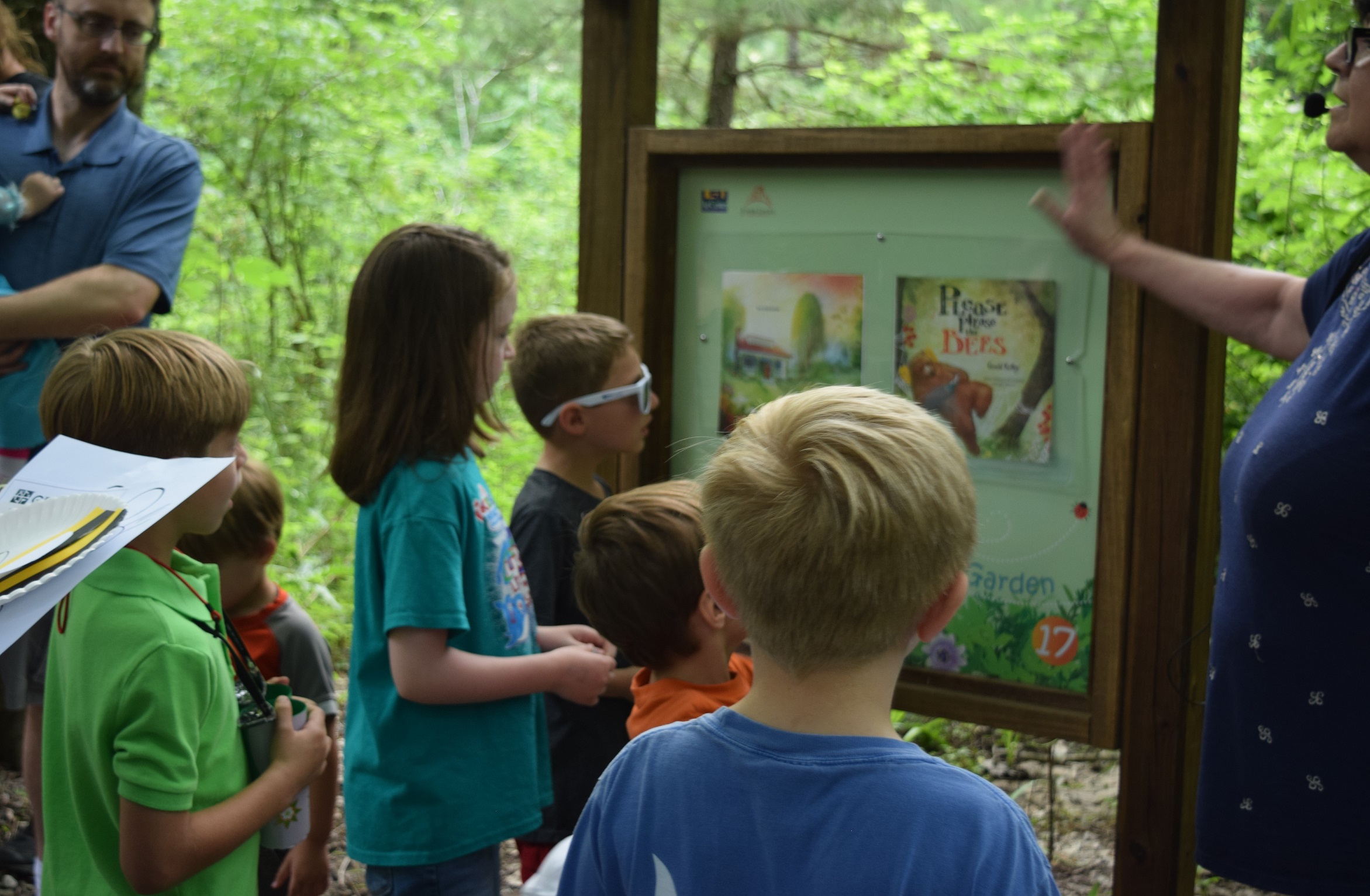 woman reading to kids