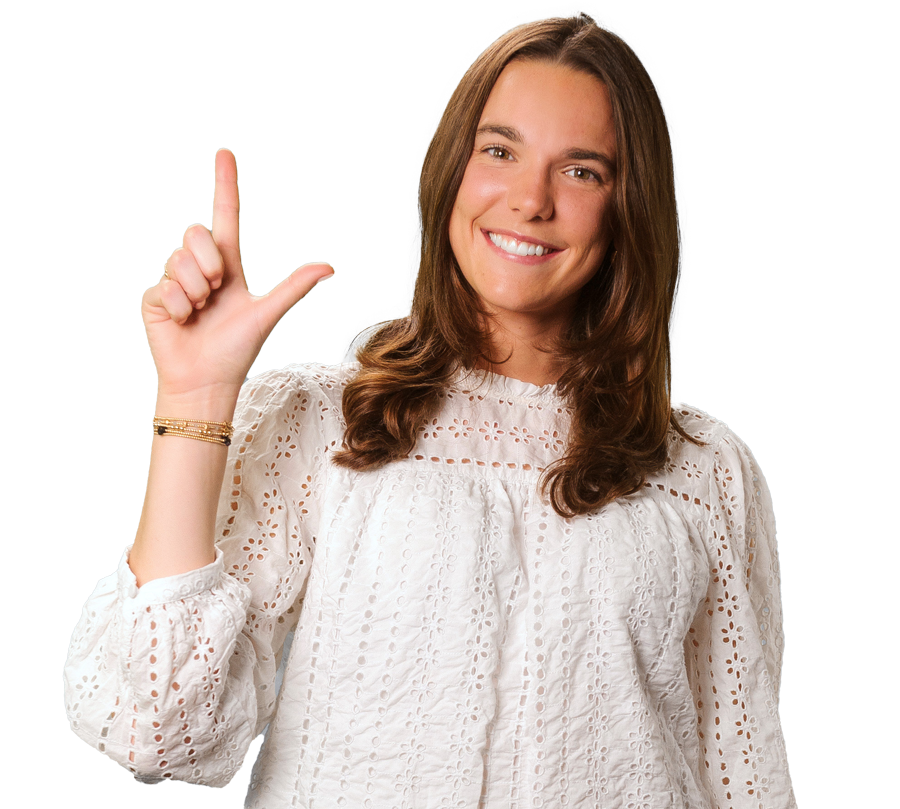 Paige Snyder is in a white shirt and smilling for a photo