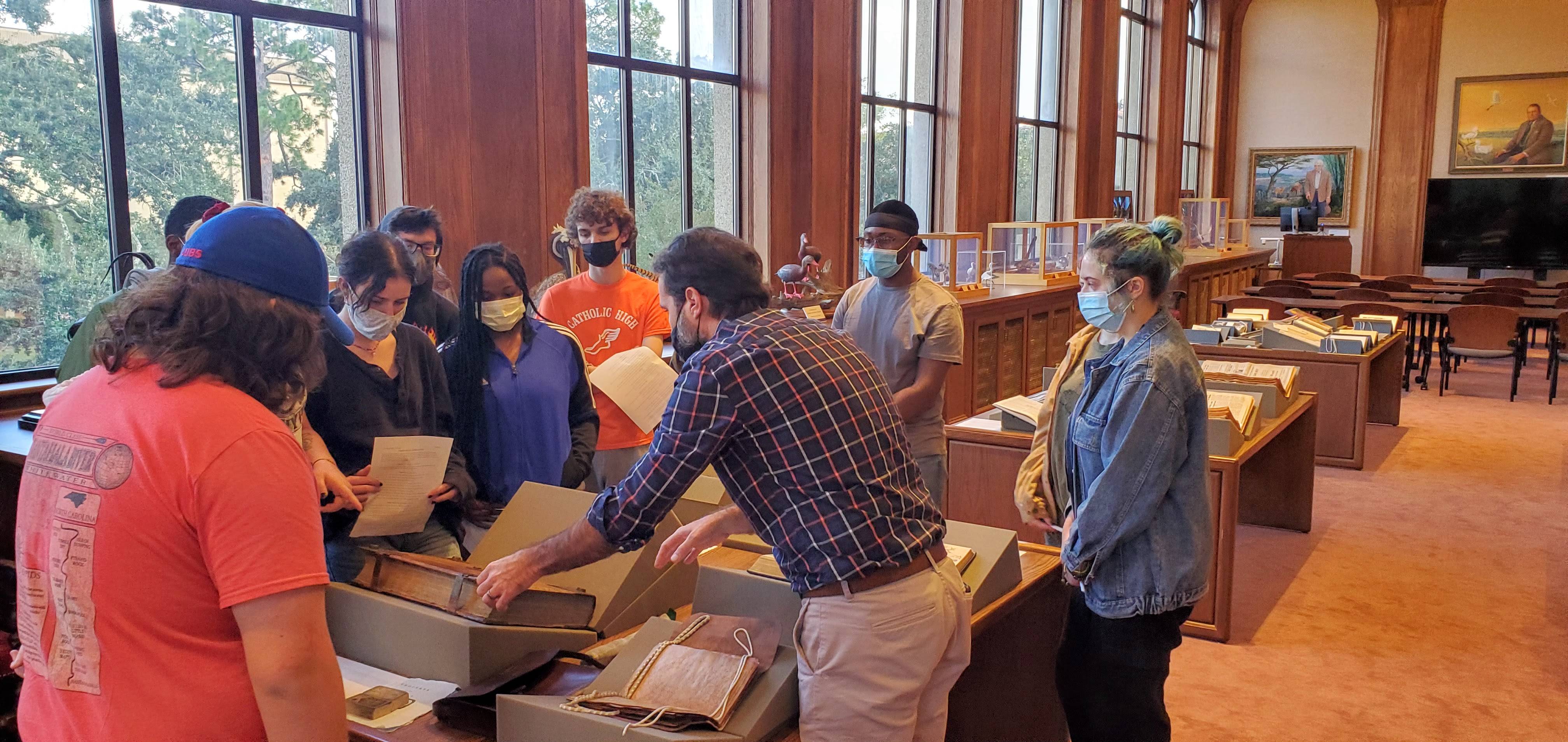 Students and professor at Hill Memorial Library